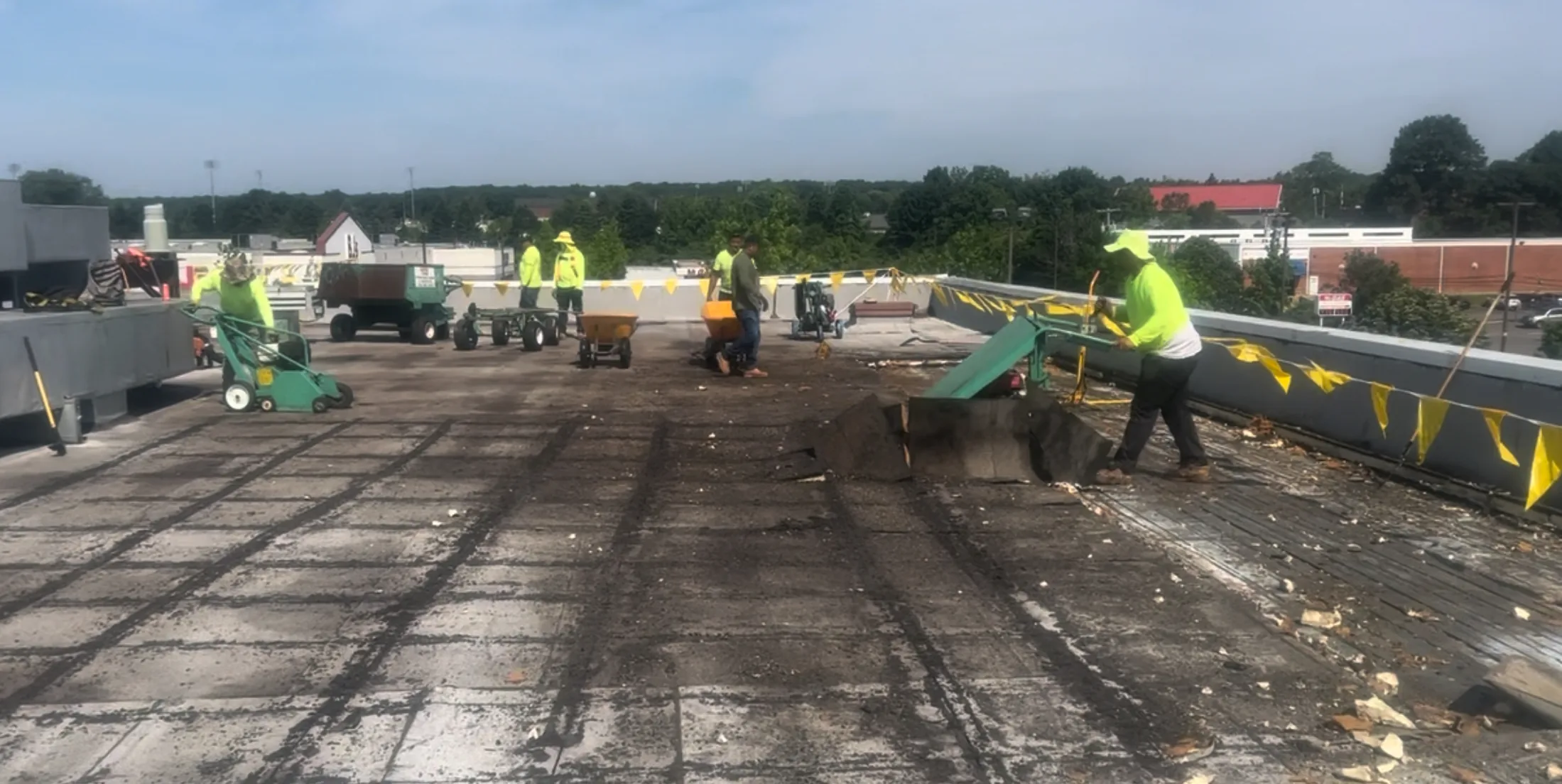 CCM Roofing crew removing the old roof at RPM Raceway